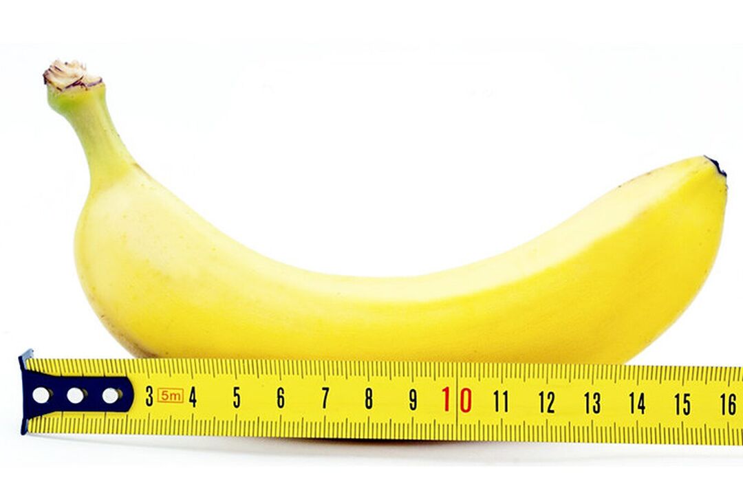 egy vonalzóval ellátott banán a pénisz műtét utáni mérését szimbolizálja
